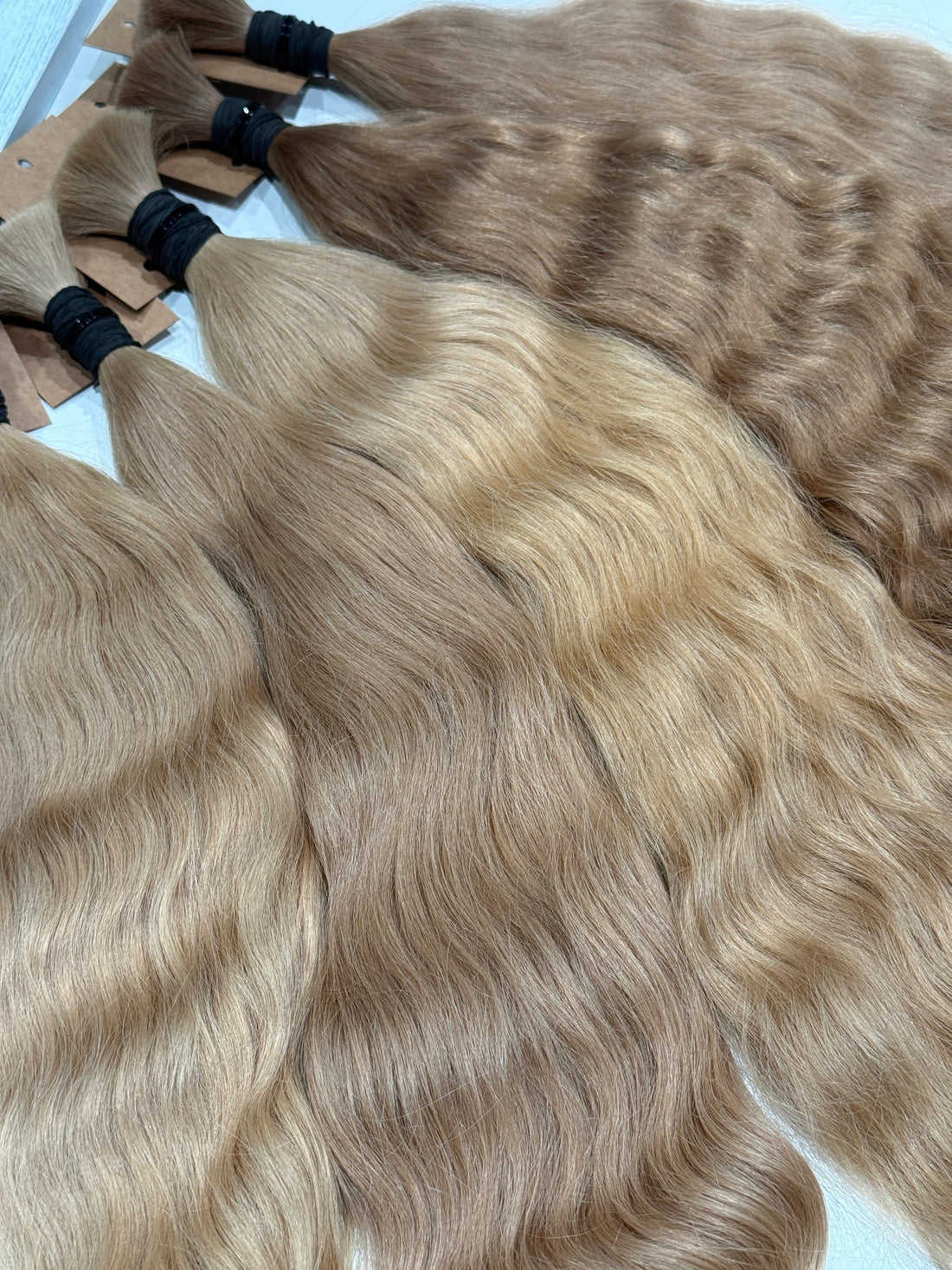 Single donor Slavic hair extensions bundle, cuticle aligned with natural shine