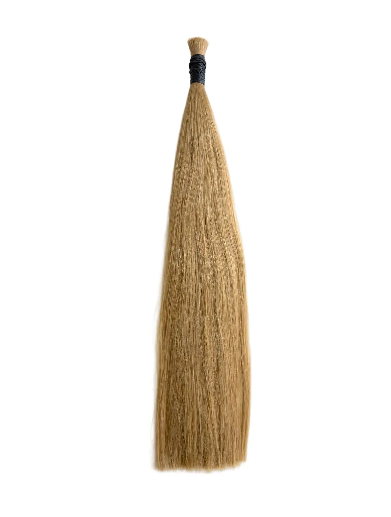 Blonde, colour number 10 hair extension with black clip on a white background