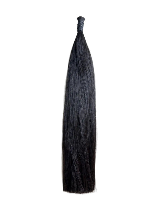 Black hair extension on a white background, colour 1B